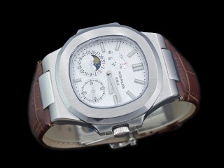 patek philippe nautilus date moonphase power reserve hand wound man watch