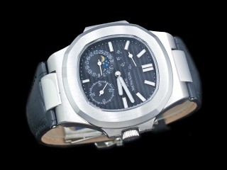 patek philippe nautilus date moonphase power reserve hand wound man watch