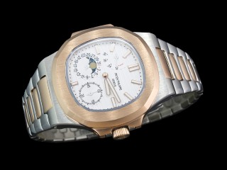 patek philippe nautilus date moonphase power reserve hand wound man watch