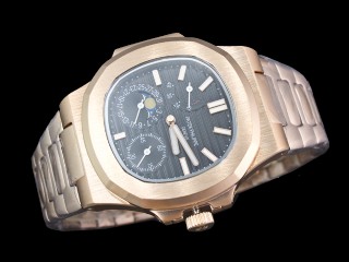 patek philippe nautilus date moonphase power reserve hand wound man watch