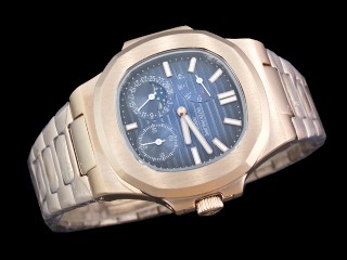 patek philippe nautilus date moonphase power reserve hand wound man watch