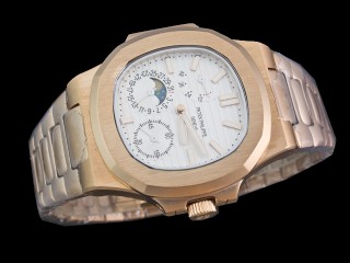 patek philippe nautilus date moonphase power reserve hand wound man watch