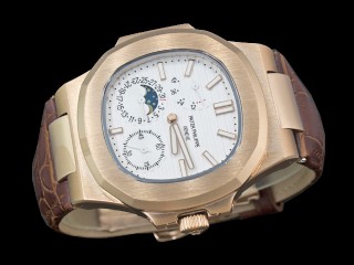 patek philippe nautilus date moonphase power reserve hand wound man watch