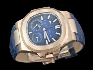 patek philippe nautilus date moonphase power reserve hand wound man watch
